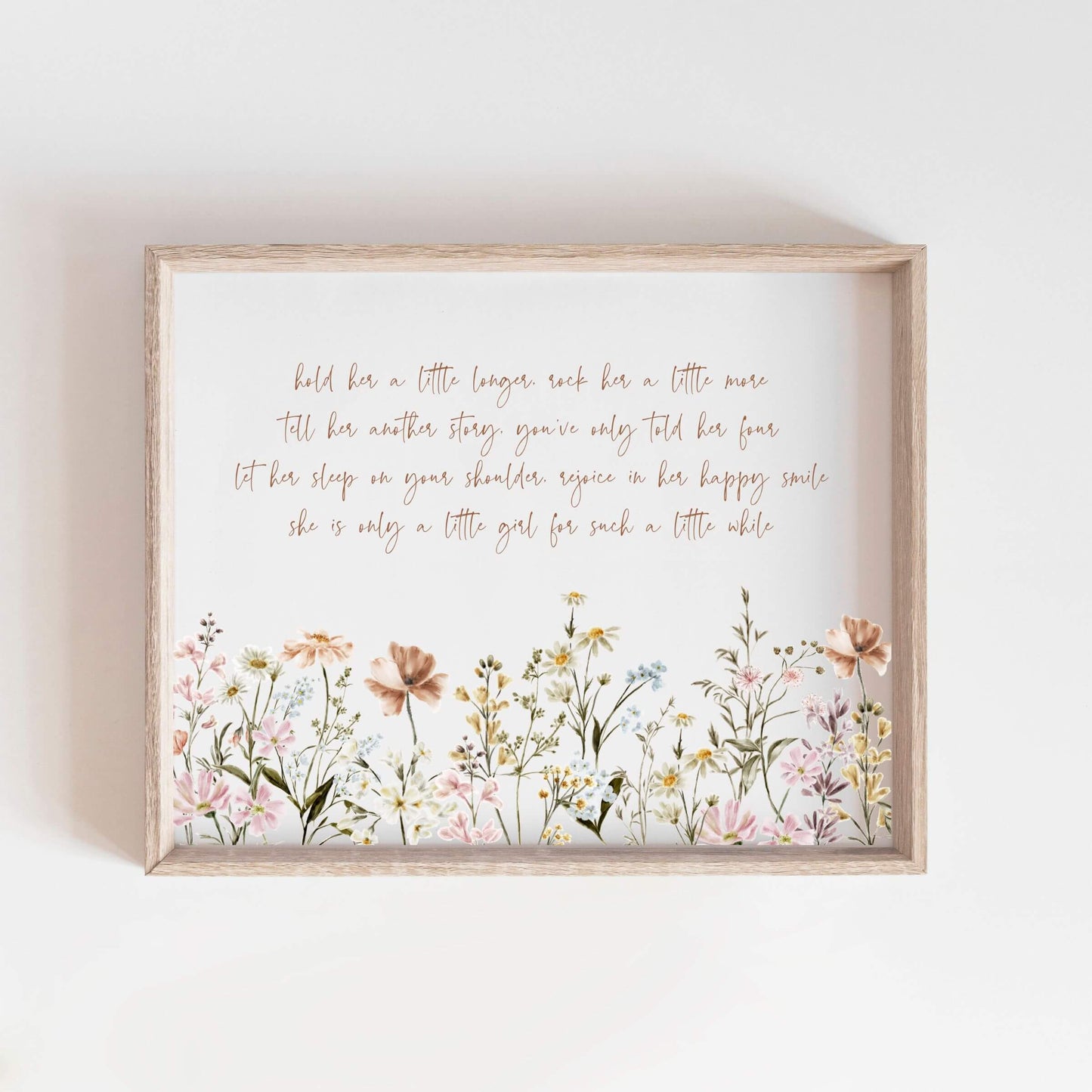 Hold Her a Little Longer nursery wall art is a beautiful and high-quality piece designed with wildflowers to bring warmth, love, and tenderness to your baby girl’s space.