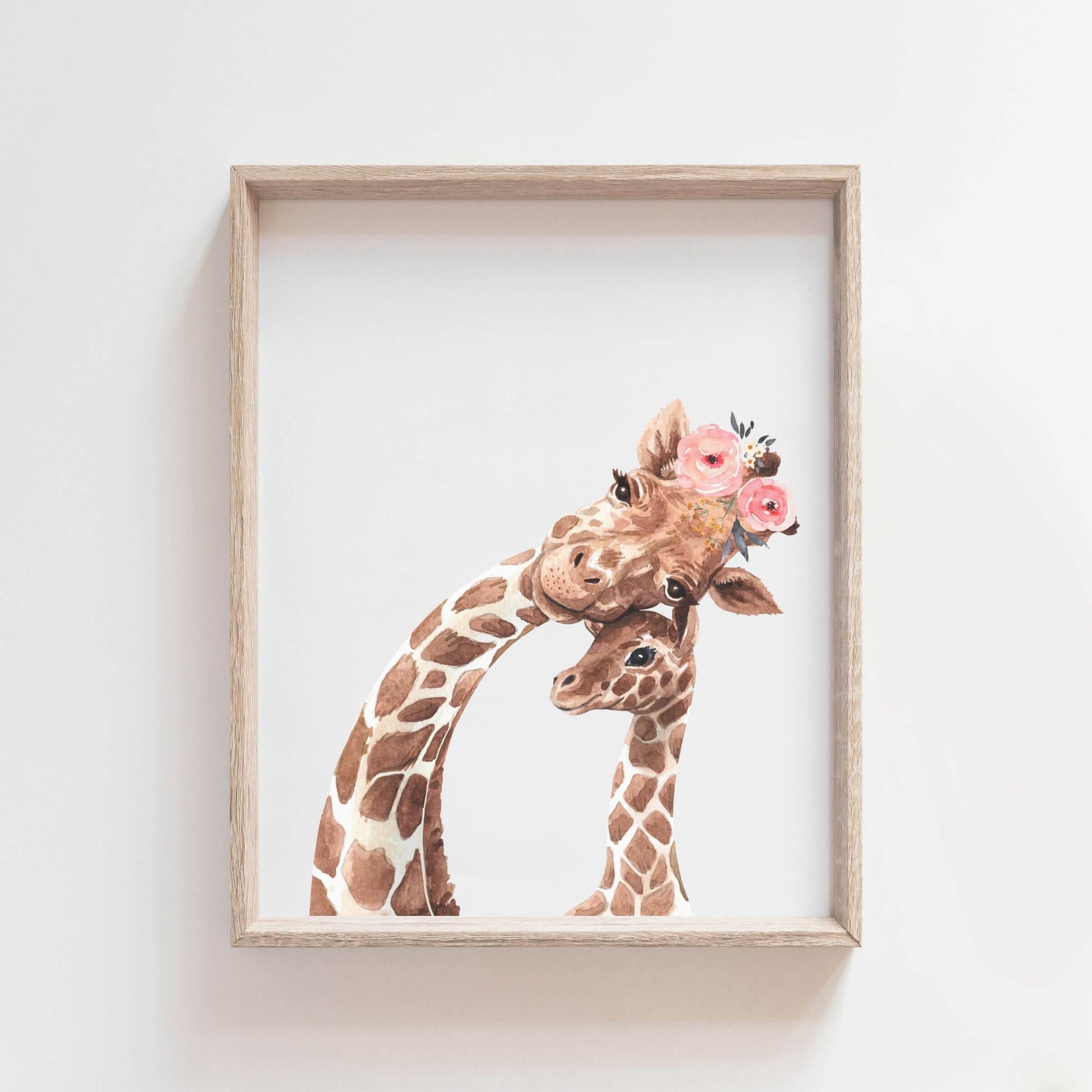 Giraffe with Pink Flower Crown wall art is a high-quality wall decor featuring a mama giraffe wearing a pink floral crown snuggling up to her sweet baby giraffe
