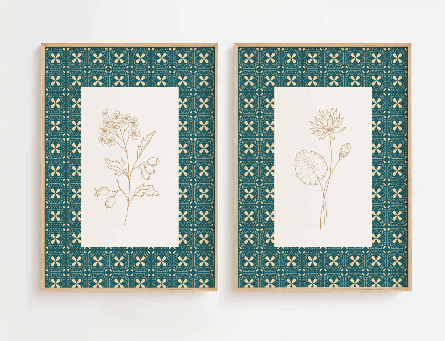 Two framed botanical prints with decorative green frames on a white background