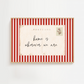 Framed postcard with red and white striped border and 'home is wherever we are' text.