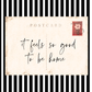 Postcard with 'it feels so good to be home' text on a black and white striped background