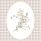 Floral design in an oval frame on a checkered background