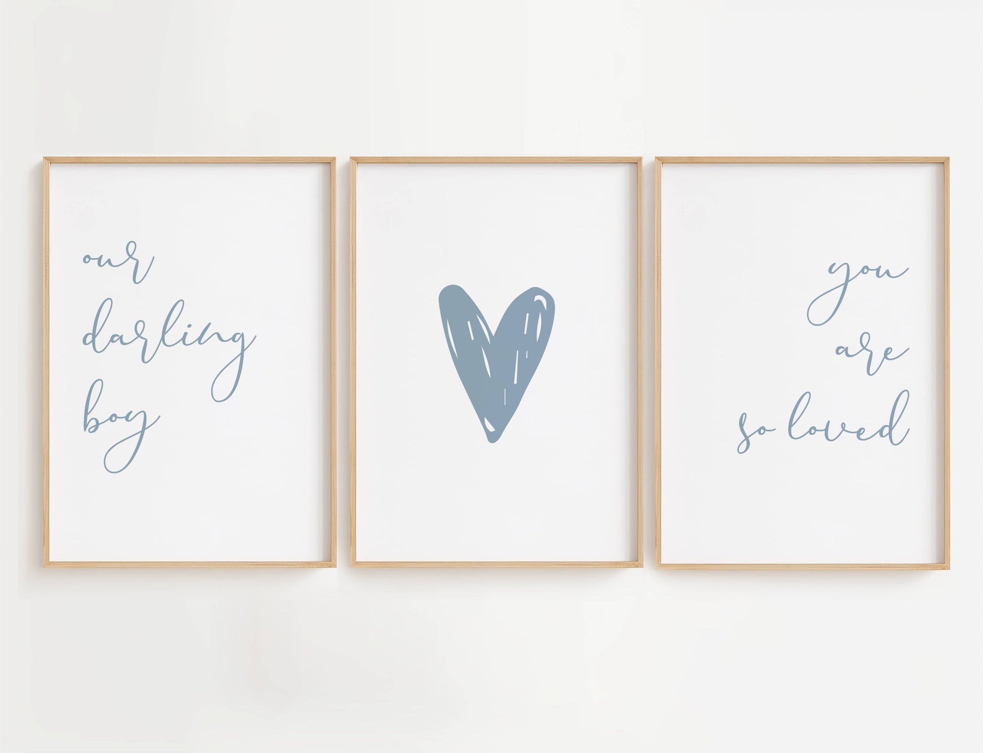 Our Darling Boy You Are So Loved wall art brings warmth and tenderness to any space. Featuring a sweet, heartfelt quote in a charming blue handwritten font, this 3-piece set captures the deep love and affection you feel for your little one.