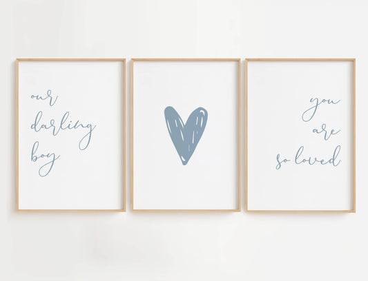 Our Darling Boy You Are So Loved wall art brings warmth and tenderness to any space. Featuring a sweet, heartfelt quote in a charming blue handwritten font, this 3-piece set captures the deep love and affection you feel for your little one.