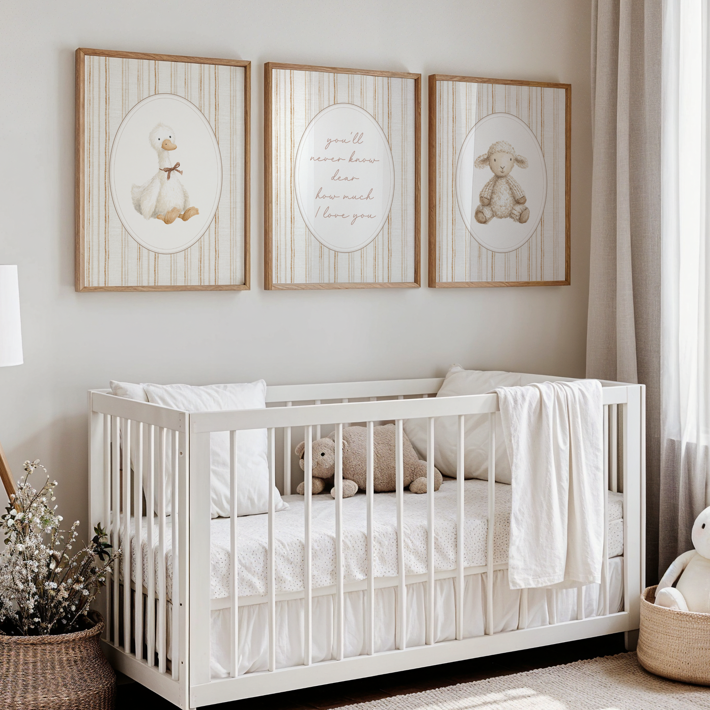 Vintage animal nursery wall art set featuring a duck with a brown bow, a white lamb and a nursery quote, You'll never know dear how much love you". Boy nursery wall art for baby boy.