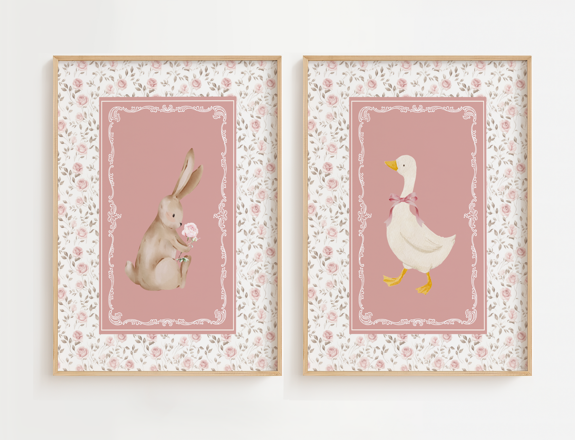 Nursery wall art featuring a vintage goose and bunny framed with a cottagecore nursery design of delicate pink and sage flowers. Girl nursery wall decor set.