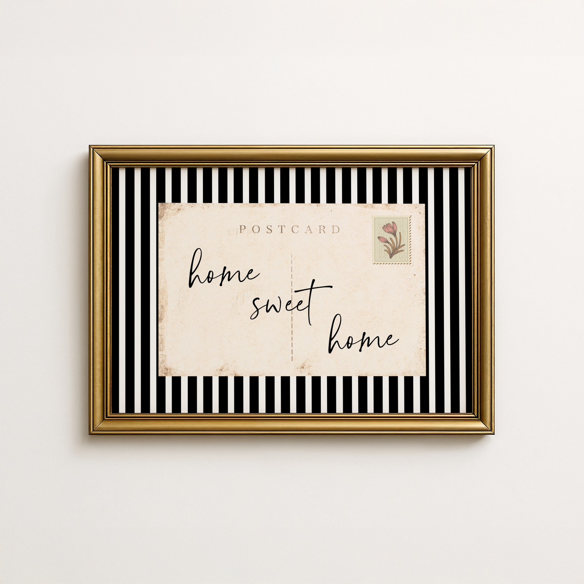 Entry way wall art featuring black and white stripes and a quote, Home Sweet Home welcome sign.