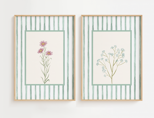 Flower bedroom wall art set featuring delicate blue and pink flowers with a green stripe boarder.