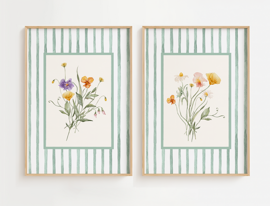 Flower living room wall art featuring pink, white and yellow flowers and bordered with green stripes.
