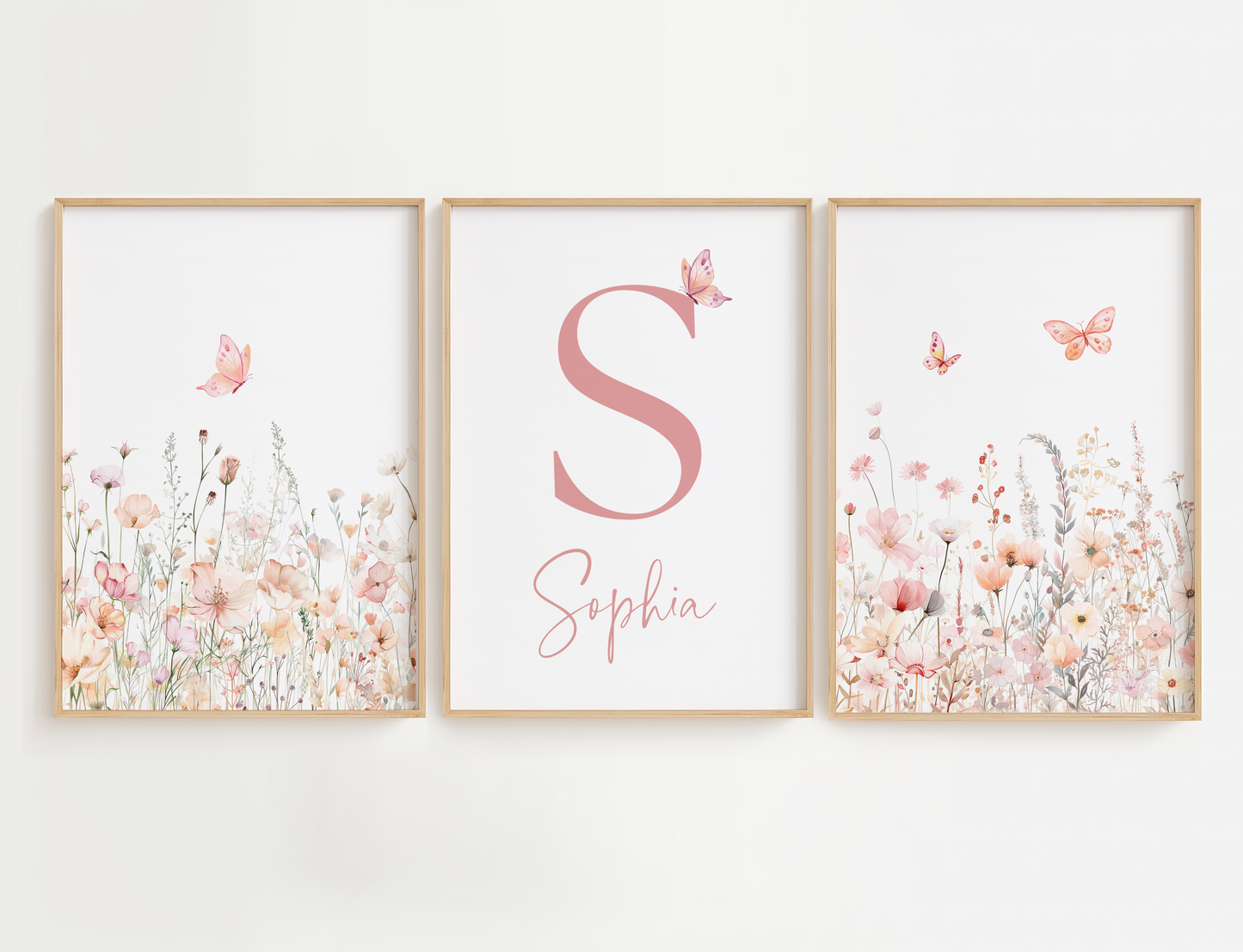 Flower nursery wall art featuring watercolor pink and sage florals and butterflies. Girl nursery wall art set of 3.