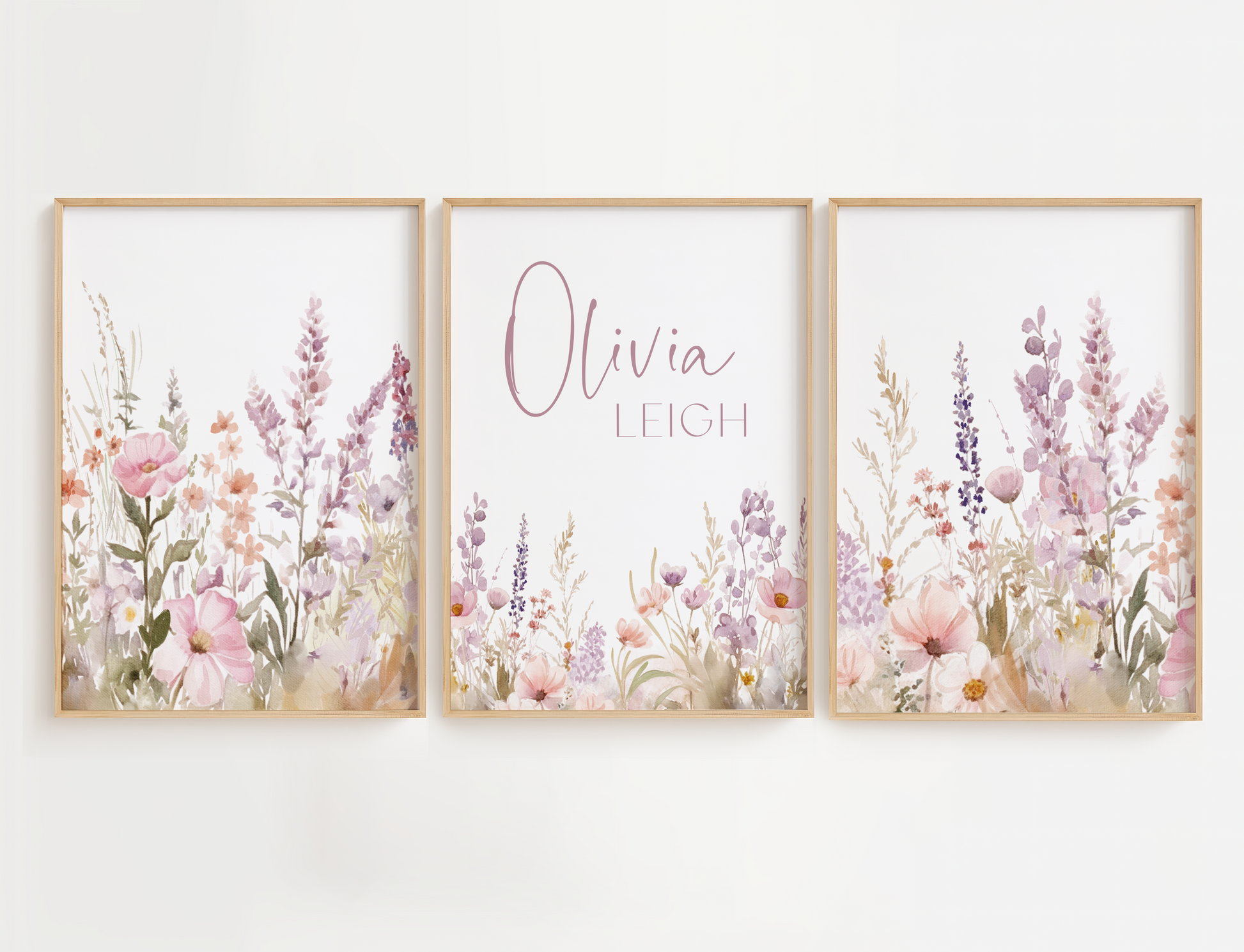Flower nursery wall art featuring purple and pink flowers and a name sign. Girl nursery wall art for baby girl room.