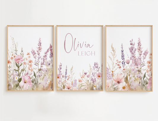 Flower nursery wall art featuring purple and pink flowers and a name sign. Girl nursery wall art for baby girl room.
