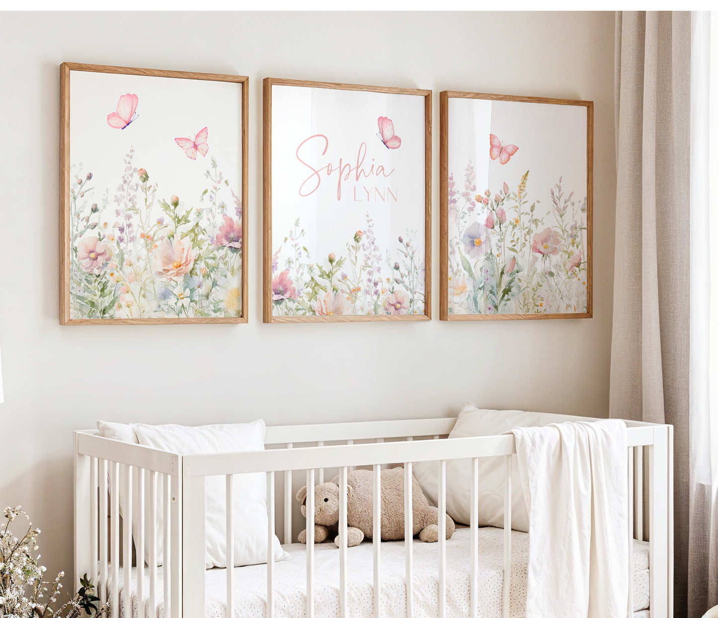 Flower nursery wall art featuring pink and sage flowers with butterflies and girl name sign. Girl nursery wall art for baby girl room.