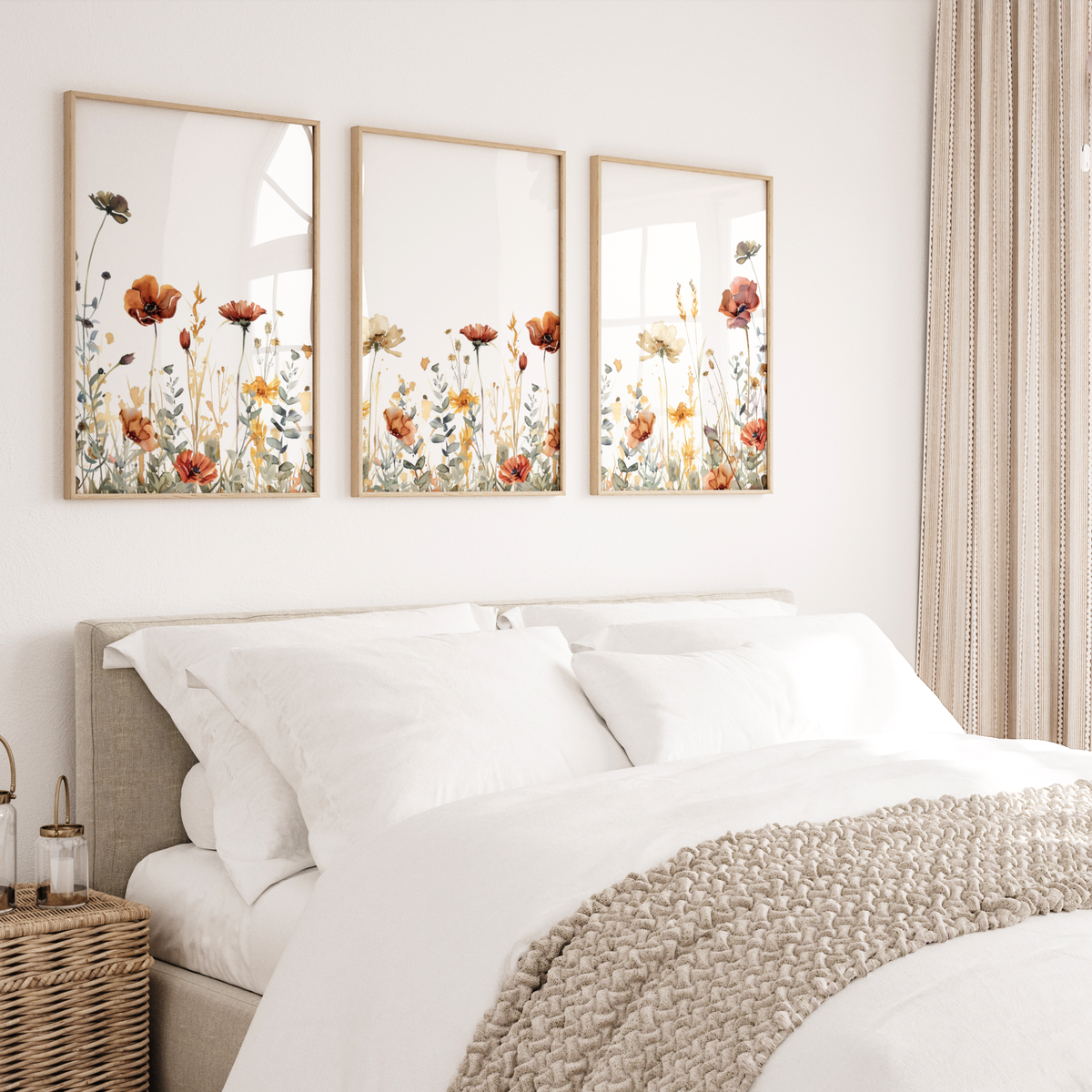 Flower wall art set of 3 featuring framed burgundy, orange, and cream color wildflowers above the bed. Set of 3 floral prints for bedroom, living room or kitchen.