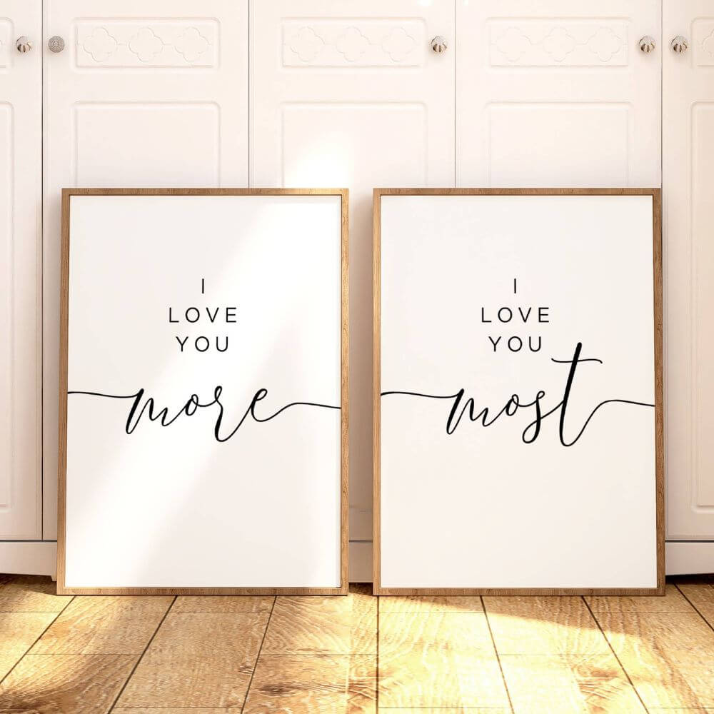 I Love You More I Love You Most wall art displayed above a bed in a warm neutral bedroom.