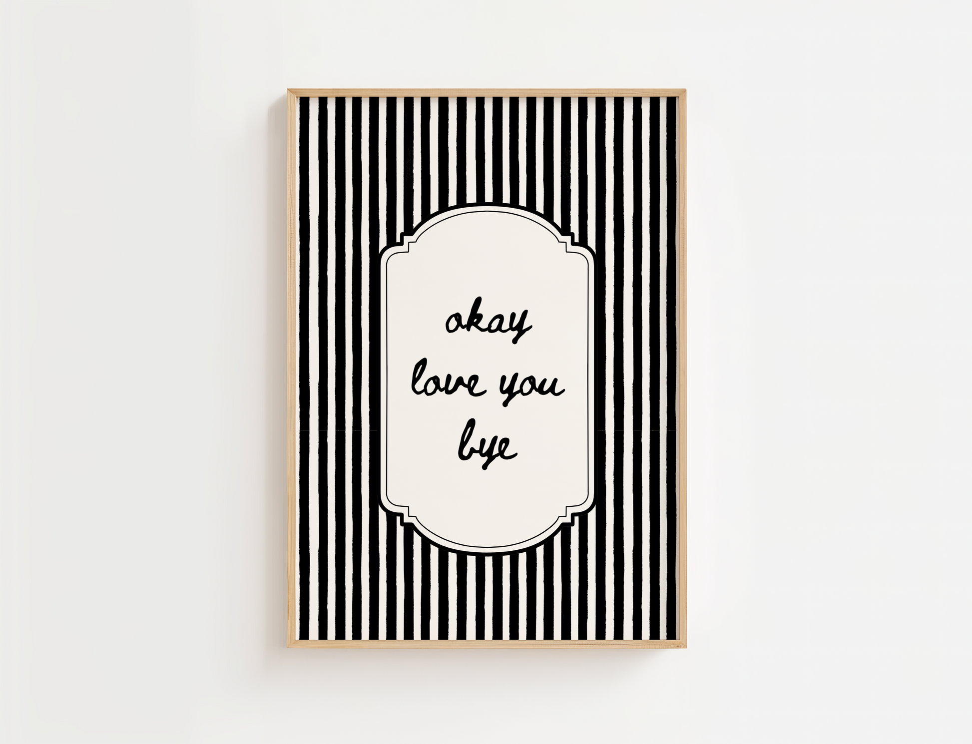 Modern wall art featuring framed artwork with black and white stripes and the quote, Okay Love You Bye. Home wall art.