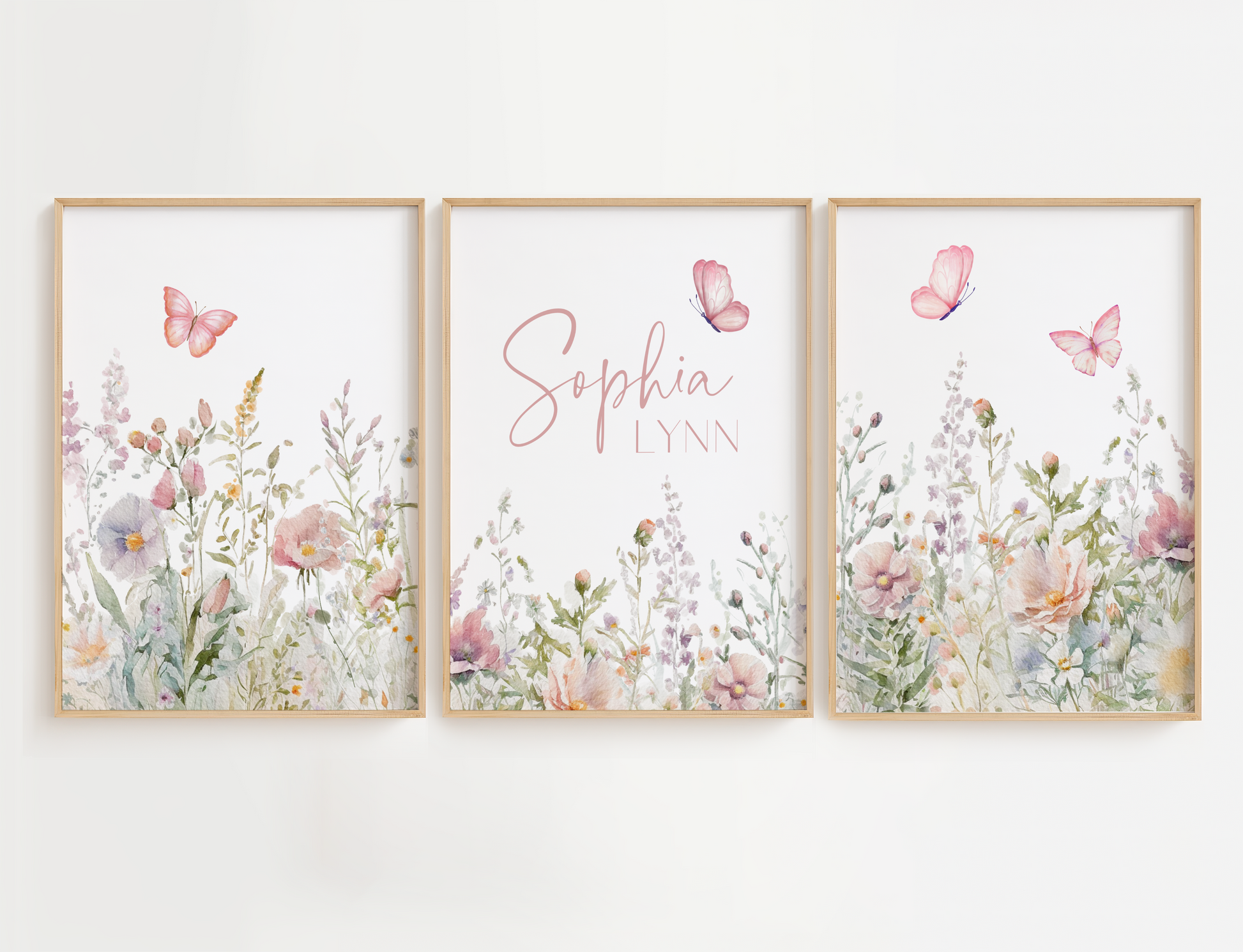 Flower nursery wall art featuring pink and sage flowers with butterflies and girl name sign. Girl nursery wall art for baby girl room.