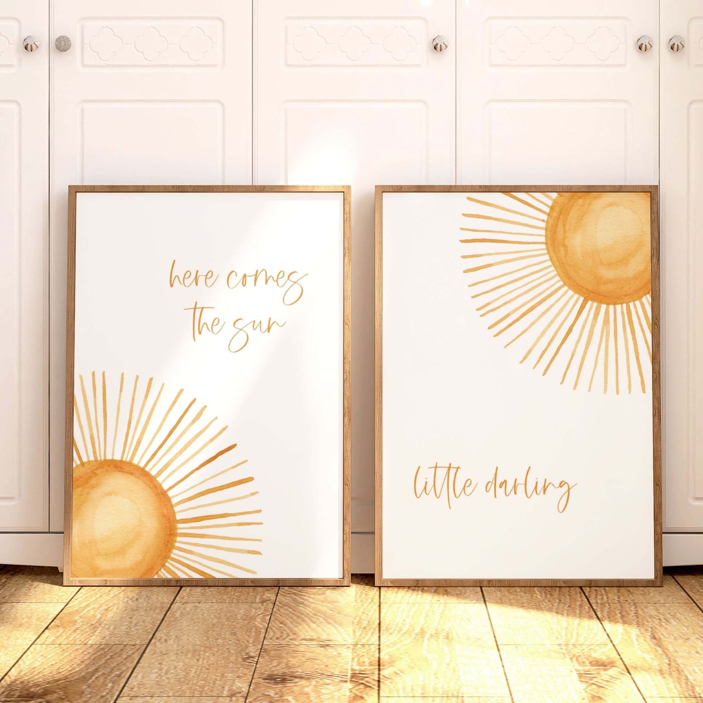 Sun nursery wall art featuring sunshine and nursery quote. Here comes the sun little darling, in framed set of 2 prints. Gender neutral nursery wall decor.