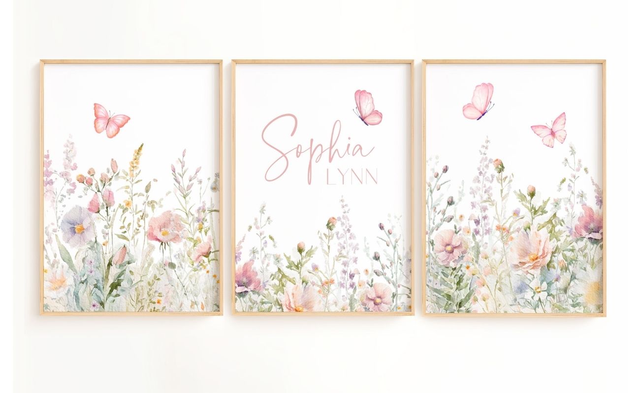 Floral nursery wall art with butterflies featuring a set of 3 prints with sage and pink flowers and a name sign for girl nursery decor.