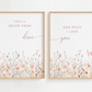 Two framed prints with floral designs and romantic text on a white background