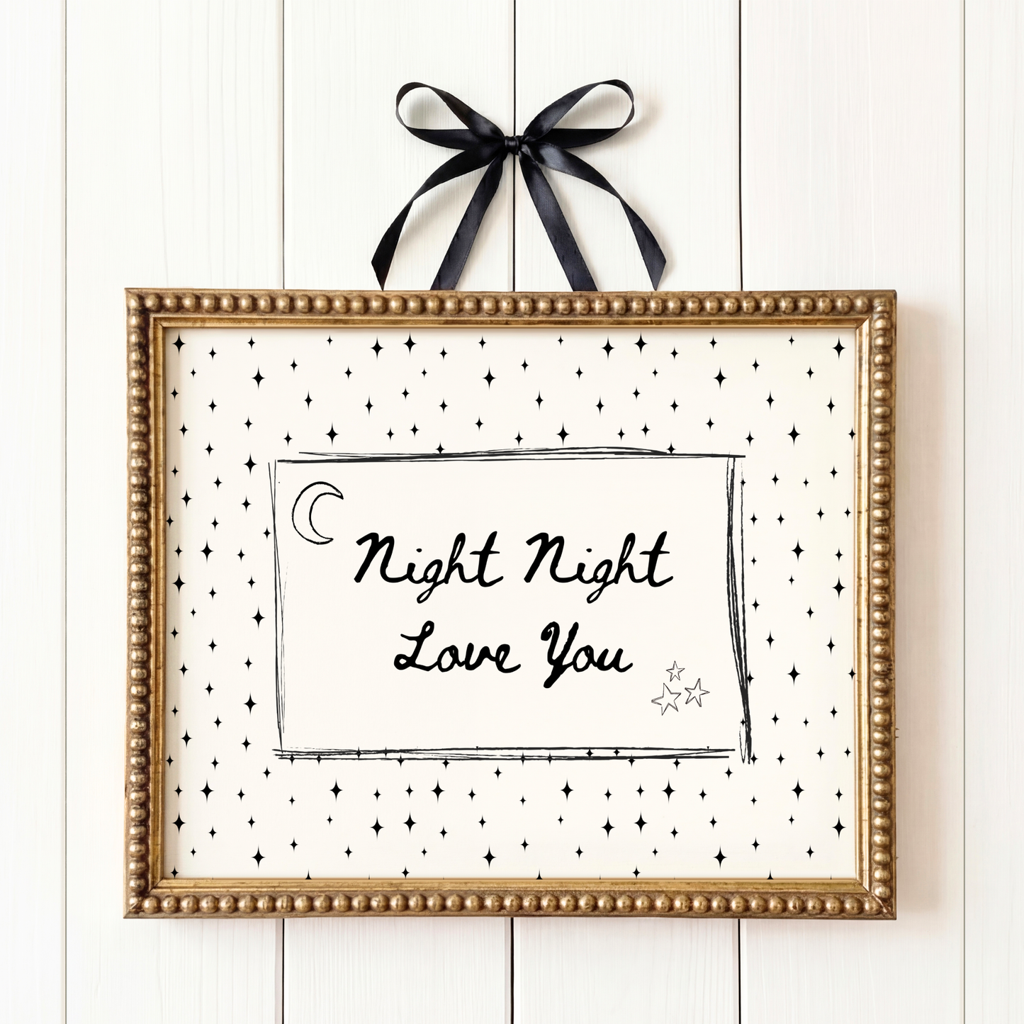 Framed artwork with 'Night Night Love You' text on a white background