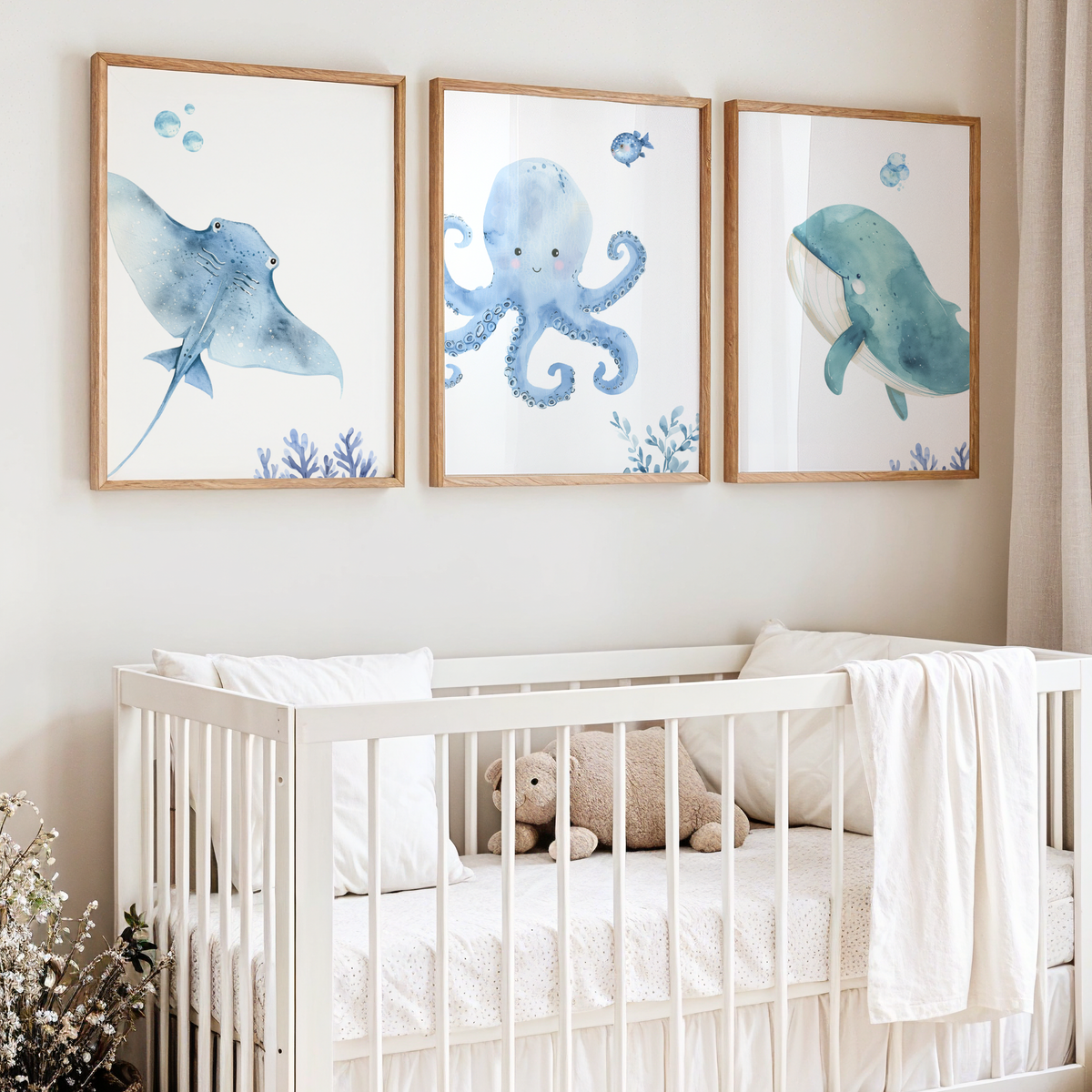 Ocean nursery wall art featuring stingray, whale, octopus and fish. Blue nursery wall art set of 3 for baby boy room.