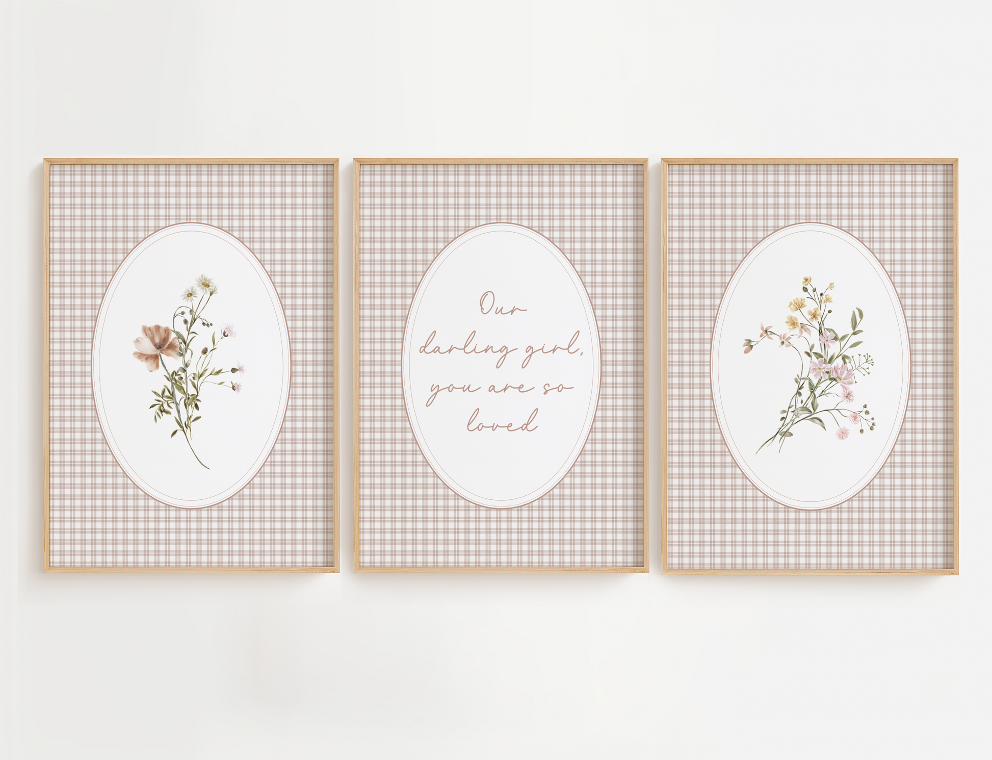 Three framed prints with floral designs and text on a white background
