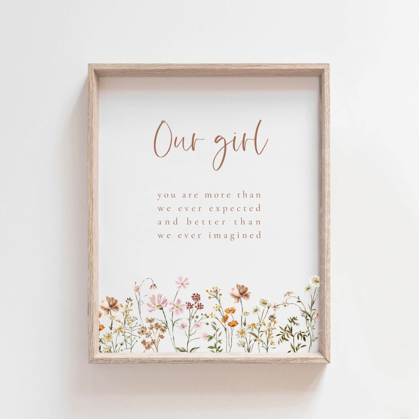 Our girl wall art with wildflowers in a wood frame