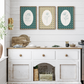 Kitchen with white cabinets, wooden countertop, and decorative wall art.