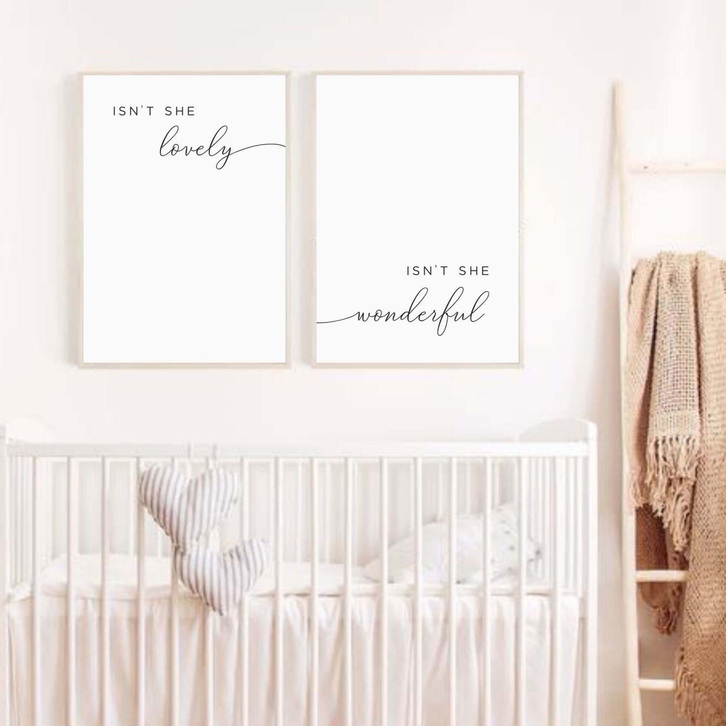 Isnt she lovely Isnt she wonderful nursery wall art for a baby girl room. Set of 2 minimalist modern designs hanging on a wall in simple wood frames.