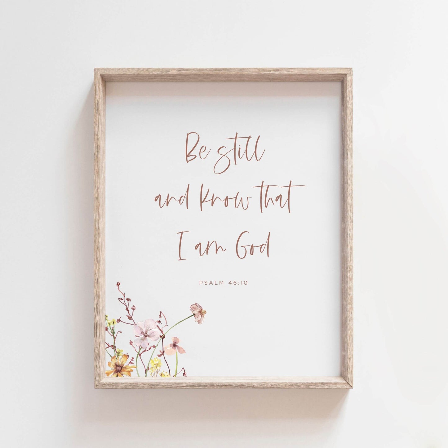 Psalm 46:10 wall art with wildflowers in a wooden frame